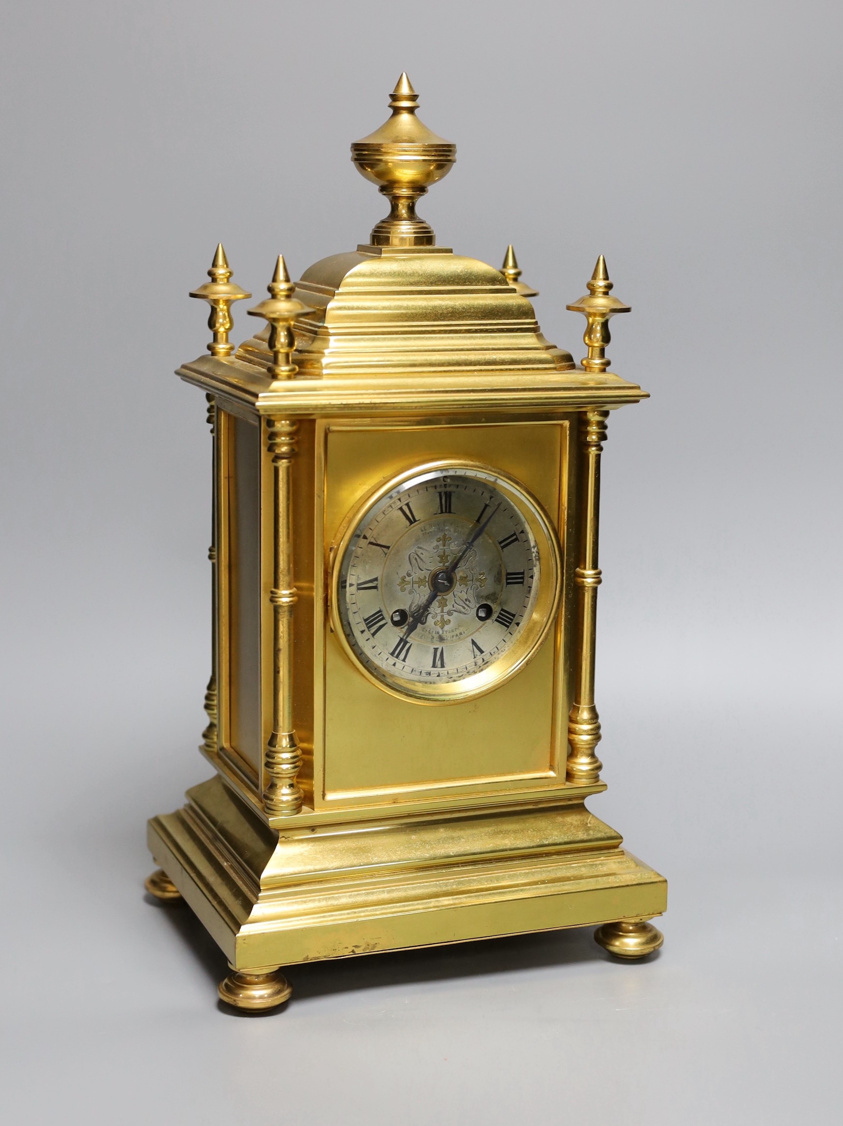 A Le Roy et Fils architectural brass mantel clock, with pendulum and key, 37cm tall